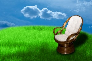Rocking chair on green grass